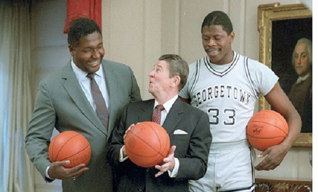 11/12/1984 President Reagan Patrick Ewing and John Thompson during a photo Op for the cover of Sports Illustrated in the Map Room