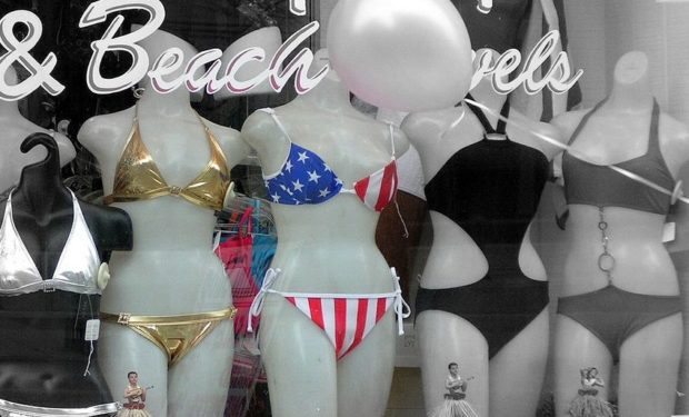 Bikinis under $150 in a shop window, online deals on bikinis abound