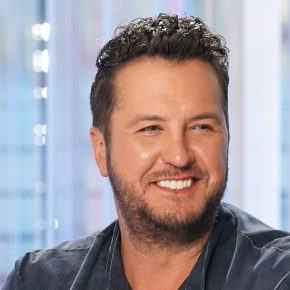 Luke Bryan’s Wife Chows Down on Fries in Tiny Mini Skirt, Stilettos Boots