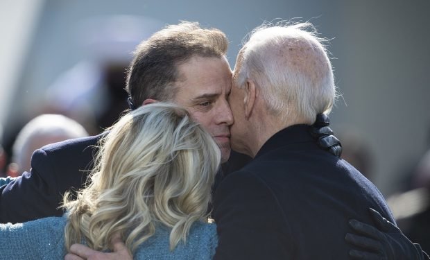 Hunter Biden hugs his parents at the Biden inauguration